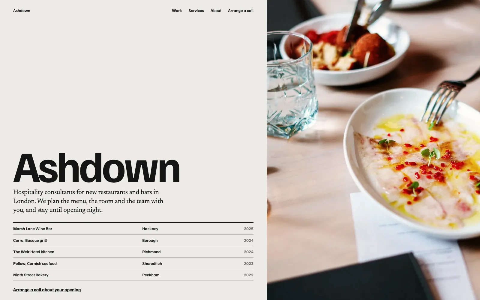 A hospitality consultant website with a full-width food photograph and ASHDOWN in large letters